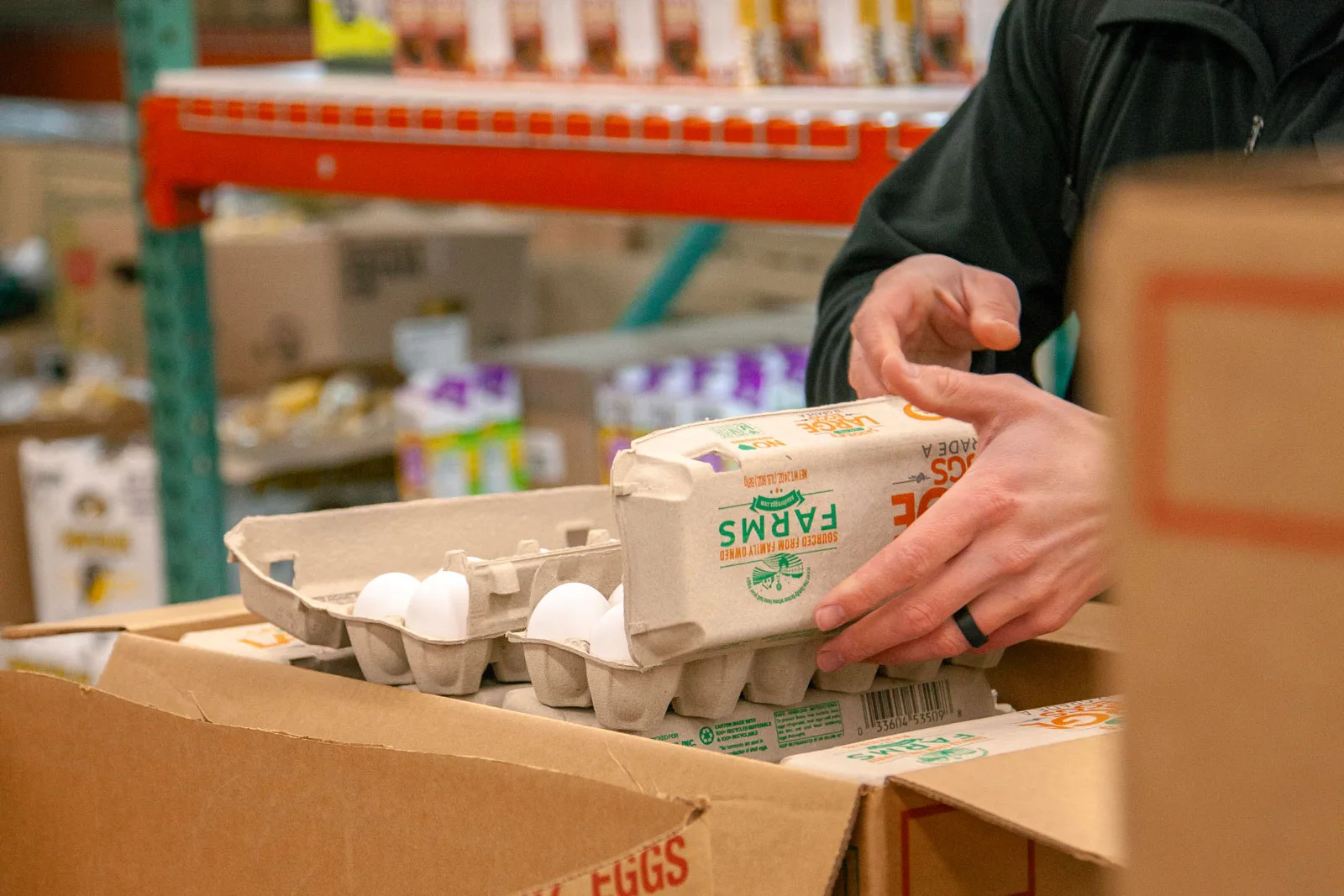 handling eggs on processing floor